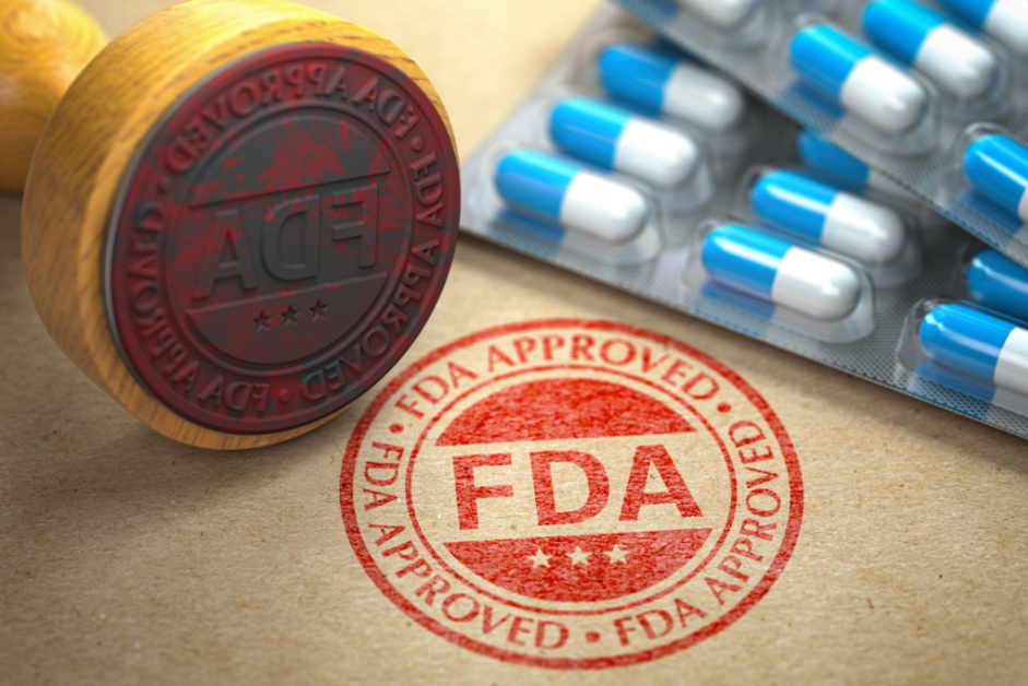 FDA stamp of approval next to a blister pack of capsules - Courtesy Microsoft Designer